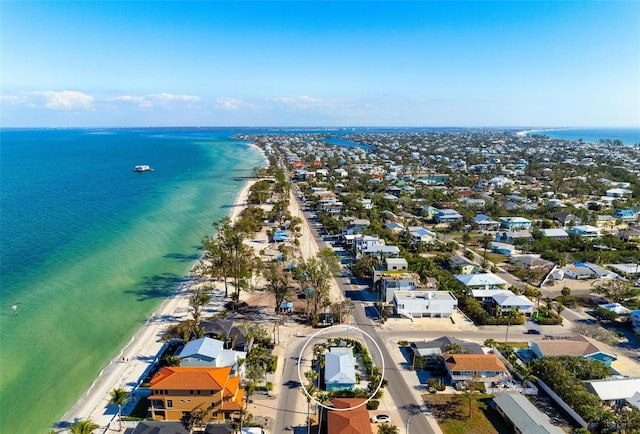 aerial view featuring a water view and a beach view