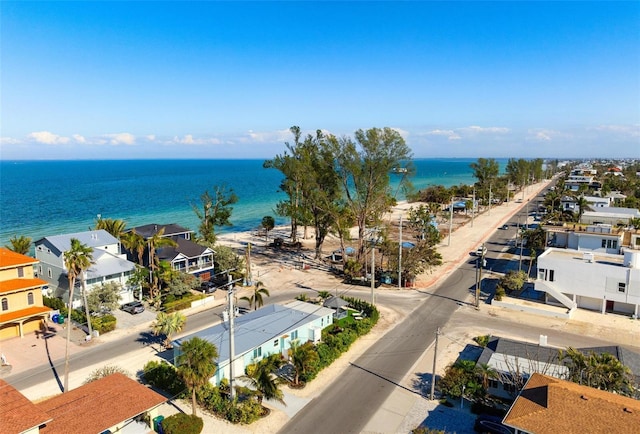 aerial view with a residential view and a water view