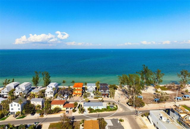 birds eye view of property with a residential view and a water view