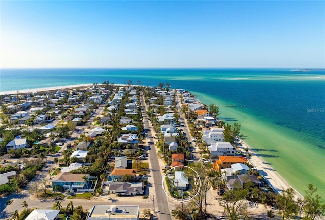 bird's eye view featuring a residential view and a water view