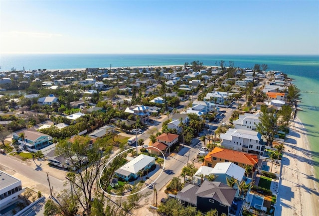 birds eye view of property featuring a residential view and a water view