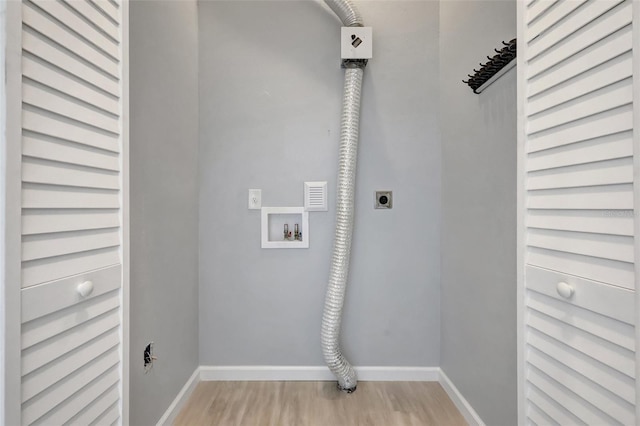 washroom with laundry area, washer hookup, baseboards, light wood finished floors, and electric dryer hookup