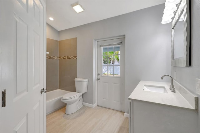 full bath with baseboards, shower / bathing tub combination, vanity, and toilet