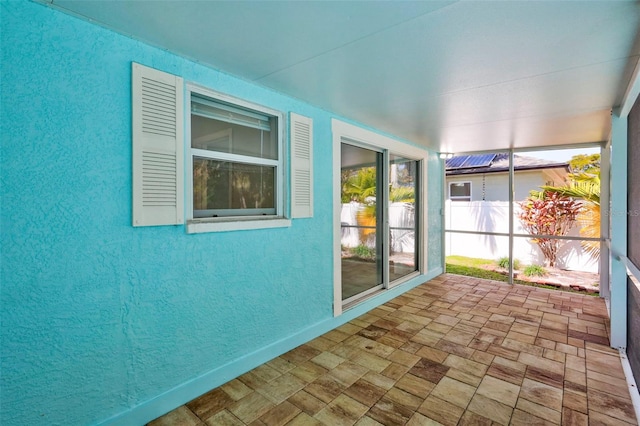 view of unfurnished sunroom