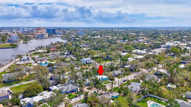 aerial view featuring a water view and a city view