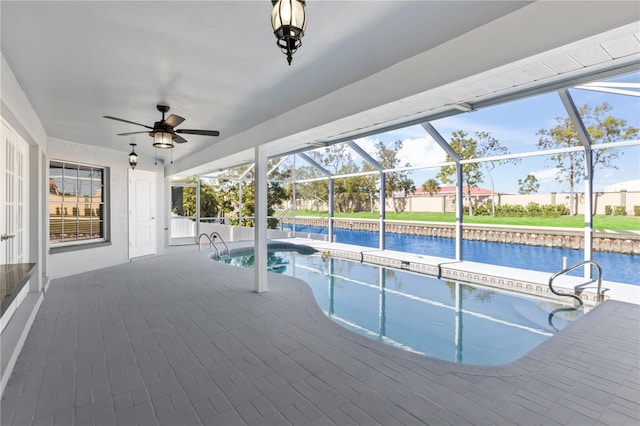 pool with a lanai, a ceiling fan, a water view, and a patio area