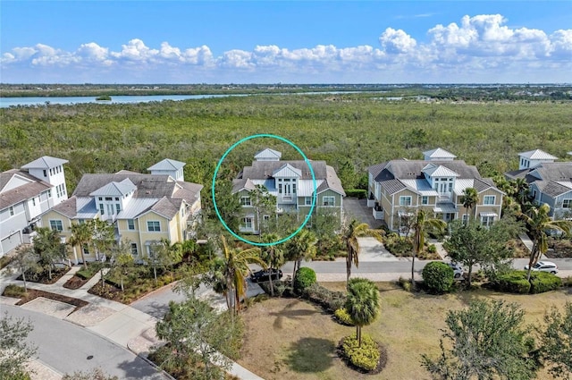 aerial view featuring a residential view and a water view