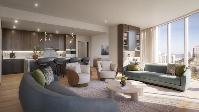 living room featuring light wood-type flooring and floor to ceiling windows