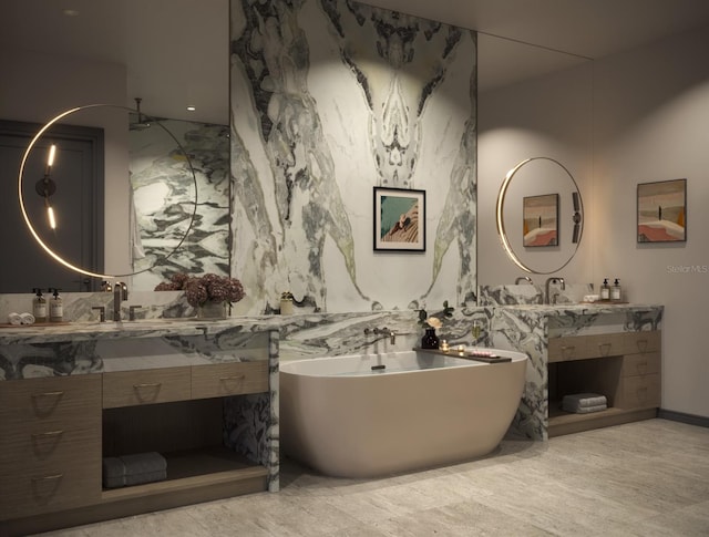 bathroom featuring a tub and vanity