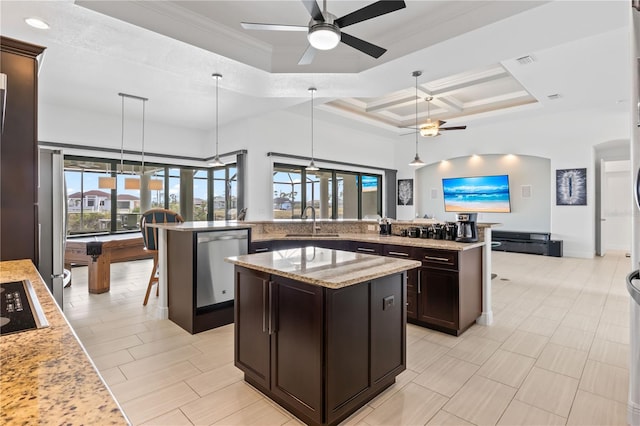 kitchen with pendant lighting, a center island, and dishwasher