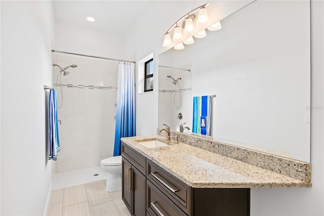 bathroom featuring vanity, tile patterned flooring, toilet, and a shower with shower curtain