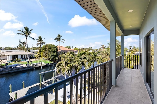 balcony featuring a water view