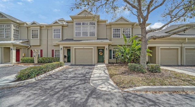 view of property with driveway