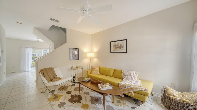 7632 Plantation Cir, Bradenton, FL 34201 - living room featuring light tile patterned floors, baseboards, visible vents, and a ceiling fan