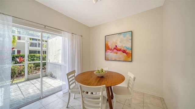 7632 Plantation Cir, Bradenton, FL 34201 - dining room featuring baseboards and light tile patterned floors