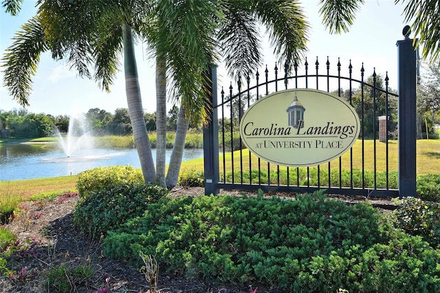 7632 Plantation Cir, Bradenton, FL 34201 - community sign featuring a lawn and a water view