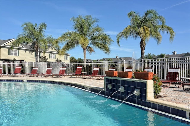 7632 Plantation Cir, Bradenton, FL 34201 - community pool with a patio and fence