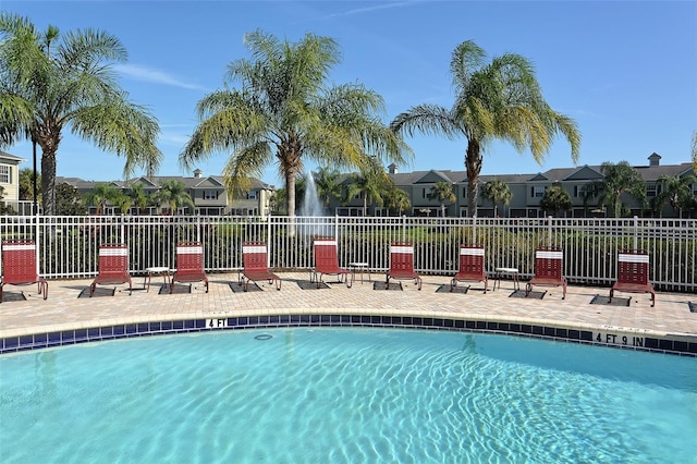 7632 Plantation Cir, Bradenton, FL 34201 - pool featuring a patio, fence, and a residential view