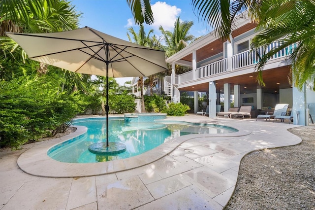 view of pool featuring a patio