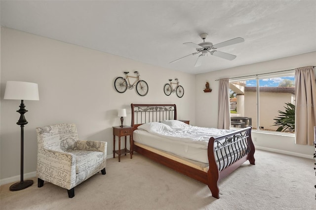 bedroom with ceiling fan and carpet