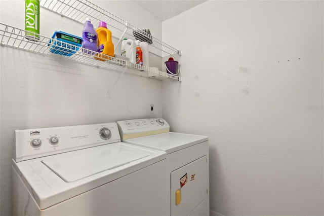 laundry area with washer and dryer