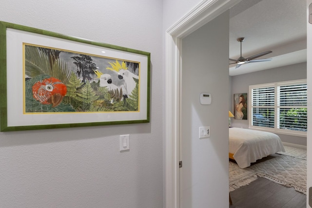 bedroom featuring wood-type flooring and ceiling fan