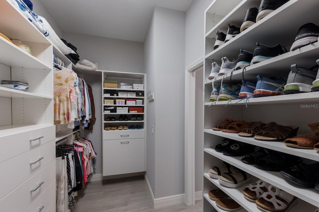 walk in closet featuring light wood-type flooring