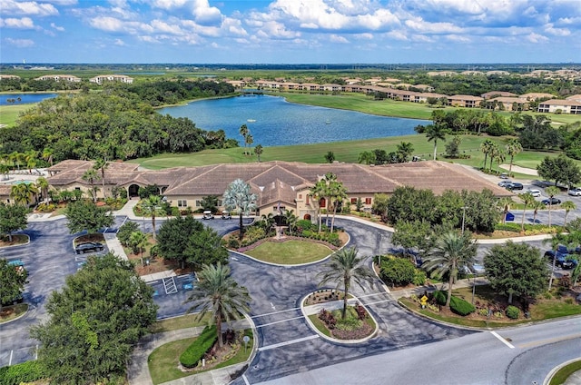 bird's eye view featuring a water view and a residential view