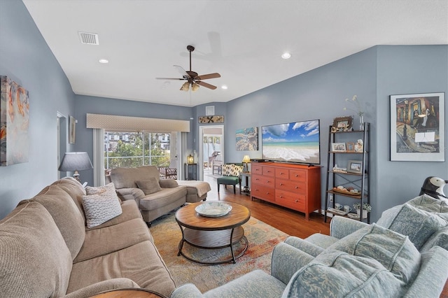 living room with ceiling fan and wood-type flooring