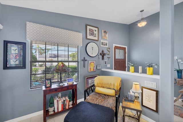 sitting room featuring light tile patterned floors