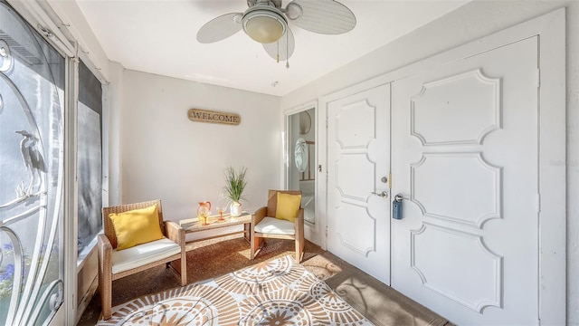 entrance foyer featuring ceiling fan