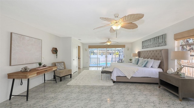 bedroom featuring ceiling fan, access to exterior, and multiple windows