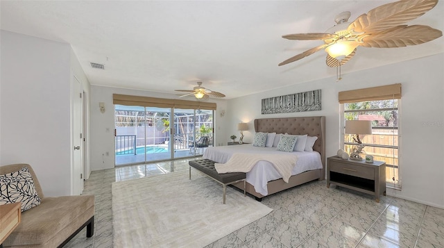 bedroom featuring access to exterior and ceiling fan