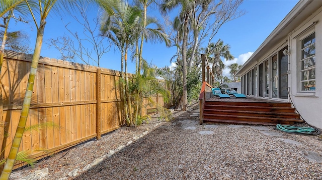 view of yard featuring a wooden deck