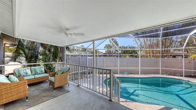 exterior space with a lanai, an outdoor hangout area, ceiling fan, and a patio area