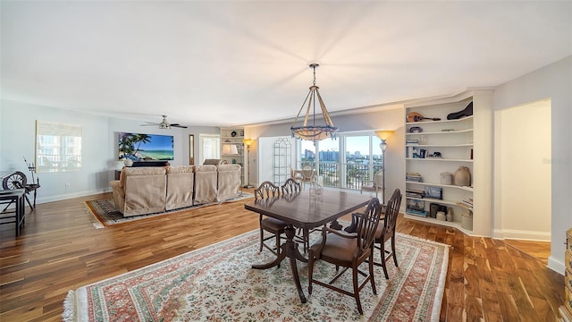 dining room with hardwood / wood-style floors