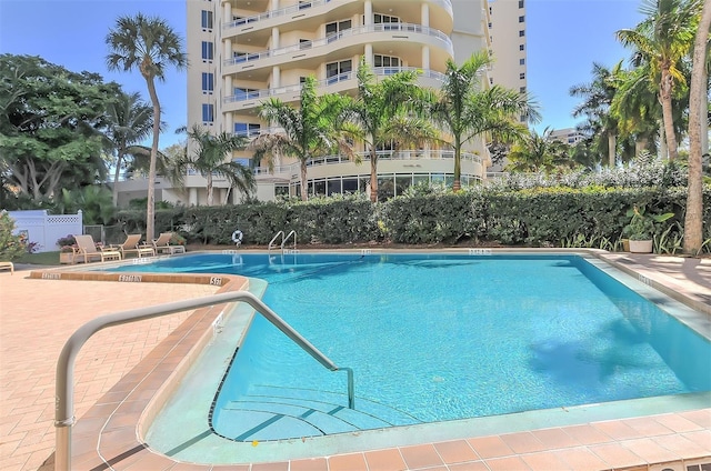 view of pool featuring a patio area