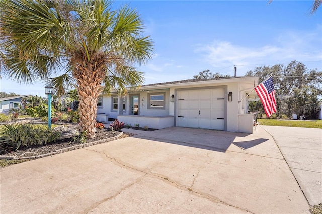 ranch-style home with a garage