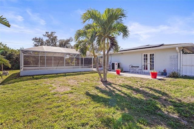 view of yard with a patio, a lanai, and ac unit