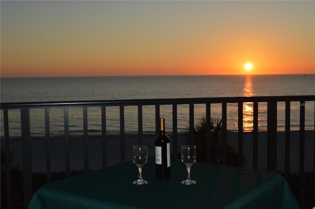 balcony at dusk with a water view