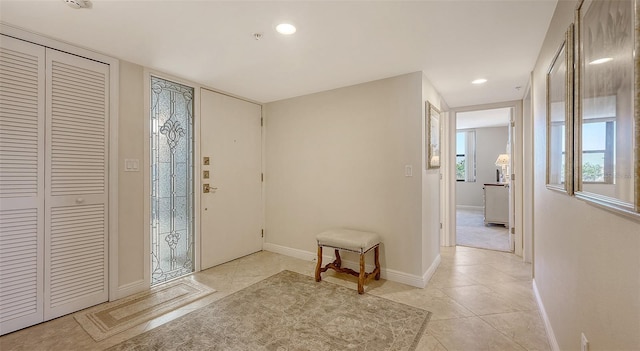 foyer with light tile patterned floors