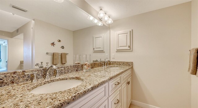 bathroom featuring vanity