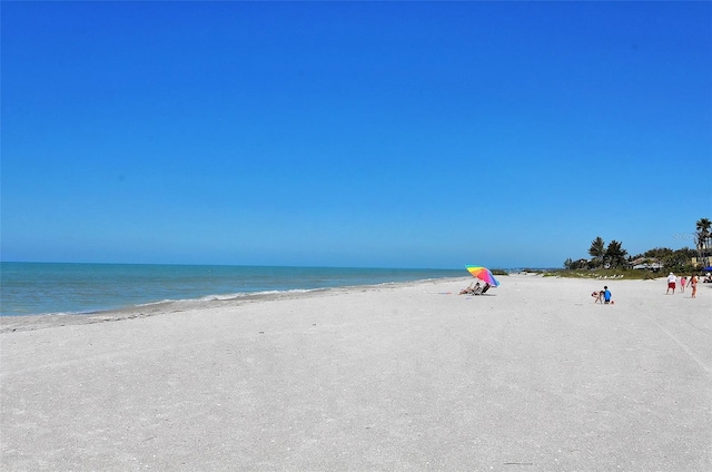 water view featuring a beach view