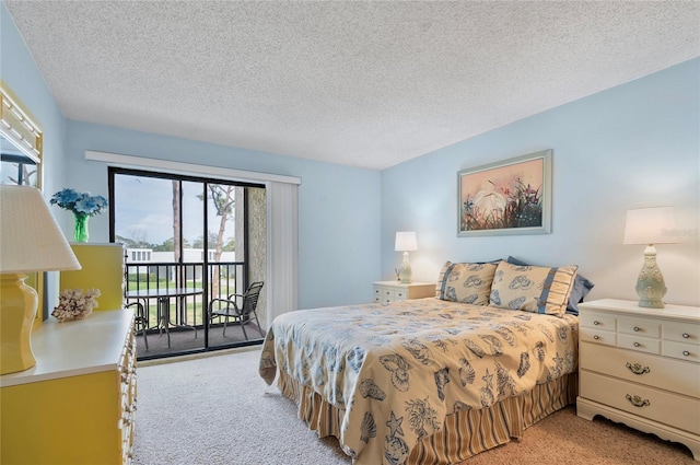 bedroom featuring access to exterior, light carpet, and a textured ceiling