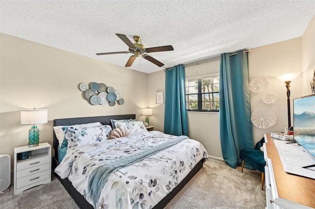 1515 Forrest Nelson Blvd Unit Q205, Port Charlotte, FL 33952 - carpeted bedroom featuring ceiling fan and a textured ceiling