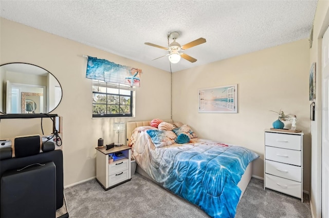 1515 Forrest Nelson Blvd Unit Q205, Port Charlotte, FL 33952 - carpeted bedroom featuring baseboards, ceiling fan, and a textured ceiling