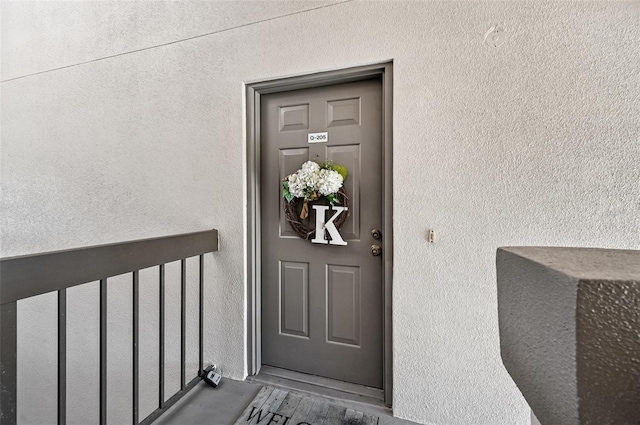 1515 Forrest Nelson Blvd Unit Q205, Port Charlotte, FL 33952 - property entrance with stucco siding