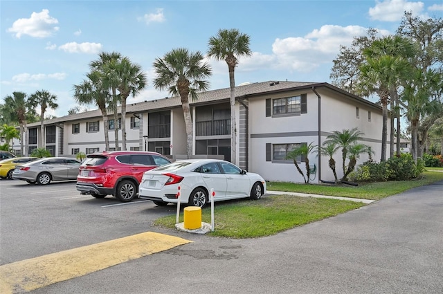 1515 Forrest Nelson Blvd Unit Q205, Port Charlotte, FL 33952 - multi unit property with stucco siding and uncovered parking