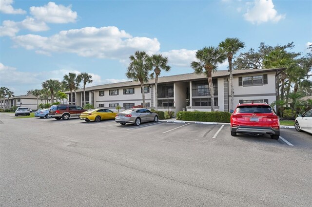 1515 Forrest Nelson Blvd Unit Q205, Port Charlotte, FL 33952 - view of property with uncovered parking