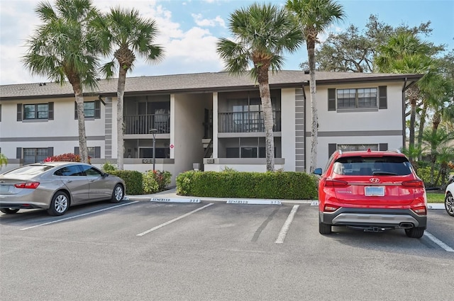 1515 Forrest Nelson Blvd Unit Q205, Port Charlotte, FL 33952 - view of property featuring uncovered parking